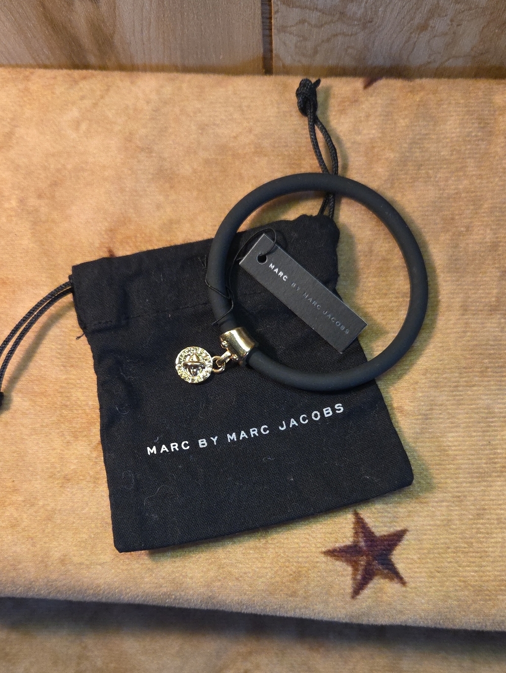 Marc by Marc Jacobs Black Bangle  with Gold Medallion